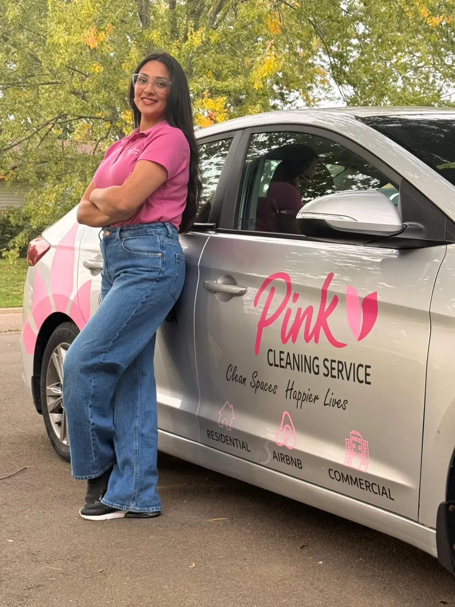 Pink Cleaning Services branded car with Residential, Airbnb and Commercial service icons